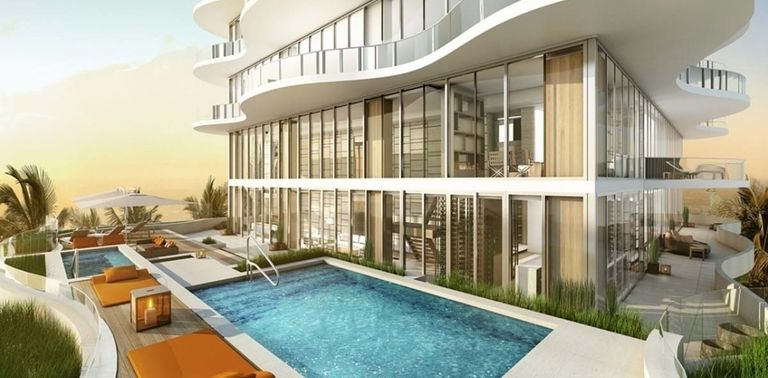 واجهة المبنى الذي تقع فيه شقة ميسي قائد برشلونة الجديدة ميسي قائد برشلونة وبعض الصور لشقته الجديدة