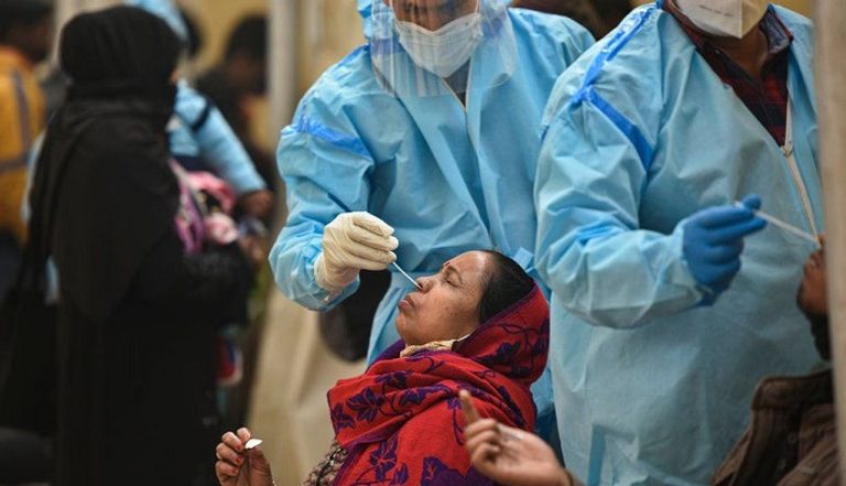 دفن أحد المتوفين بكورونا في البرازيل- أرشيفية