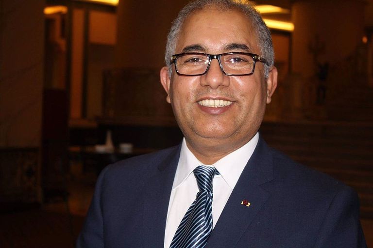 الدكتور محمد البشاري، الأمين العام للمجلس العالمي للمجتمعات المسلمة شعار المجلس العالمي للمجتمعات المسلمة