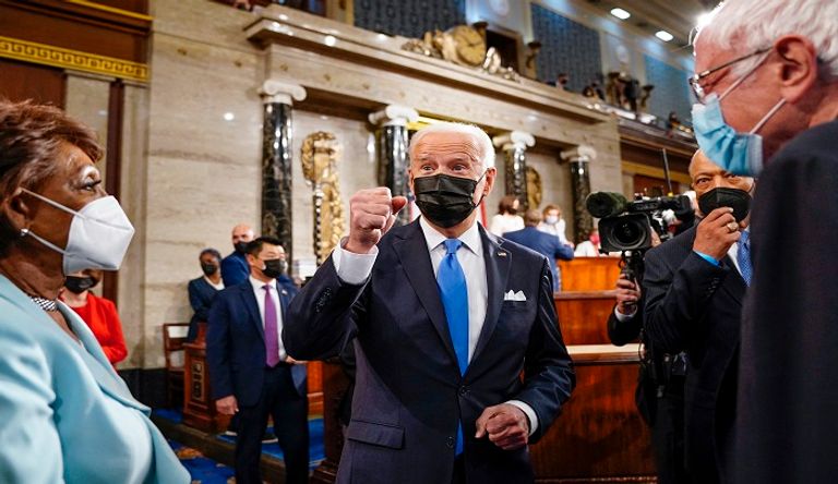 بايدن في الكونجرس ومن خلفه هاريس وبيلوسي - الفرنسية