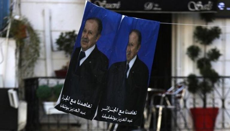ملصقات انتخابية للرئيس الجزائري السابق عبد العزيز بوتفليقة - أرشيفية