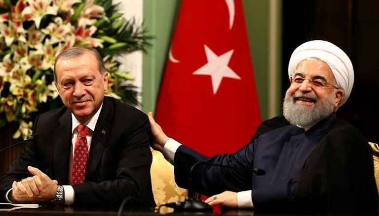 الرئيسان التركي رجب طيب أردوغان والإيراني حسن روحاني - أرشيفية