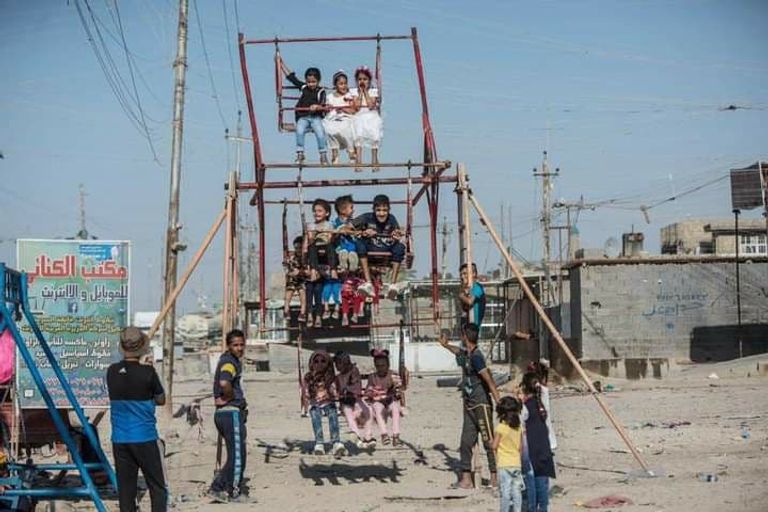 أطفال في بغداد يحتفلون بالعيد