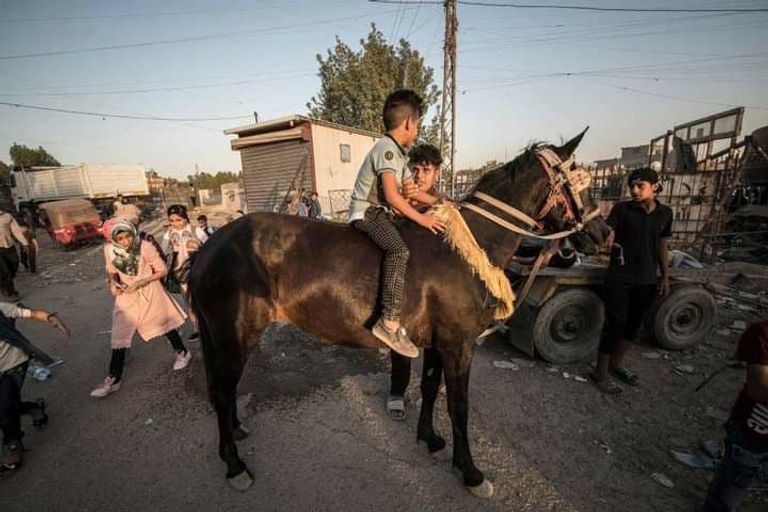 أطفال في بغداد يحتفلون بالعيد