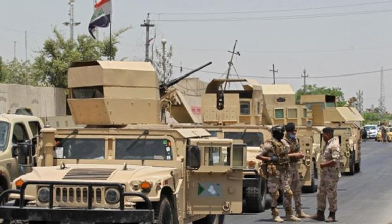 عناصر ومركبات تابعة لقوات الأمن العراقية - أ.ف.ب