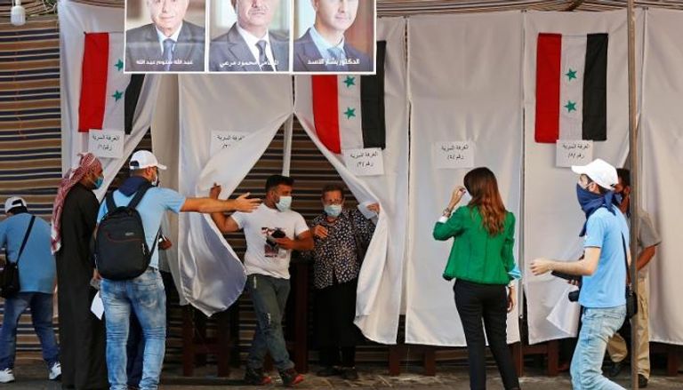 الأسد يسعى لولاية رابعة في منافسة مرشحين اثنين- رويترز