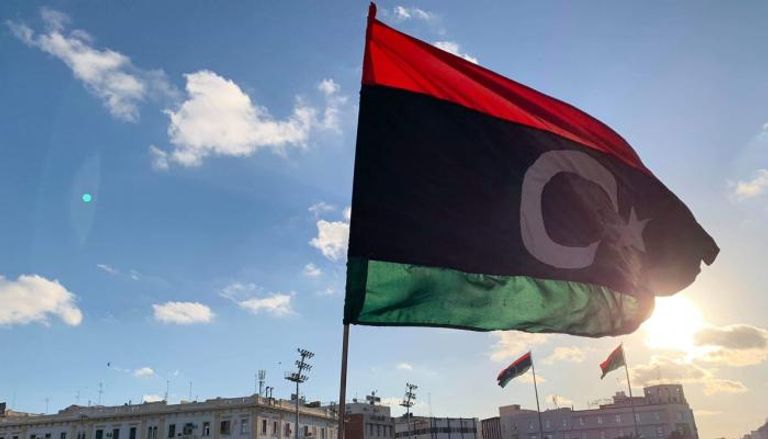 العلم الليبي بأحد ميادين البلاد - أرشيفية