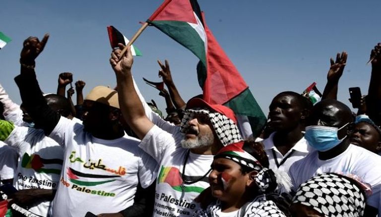 جانب من المظاهرات الداعمة لفلسطين في السنغال-أ.ف.ب