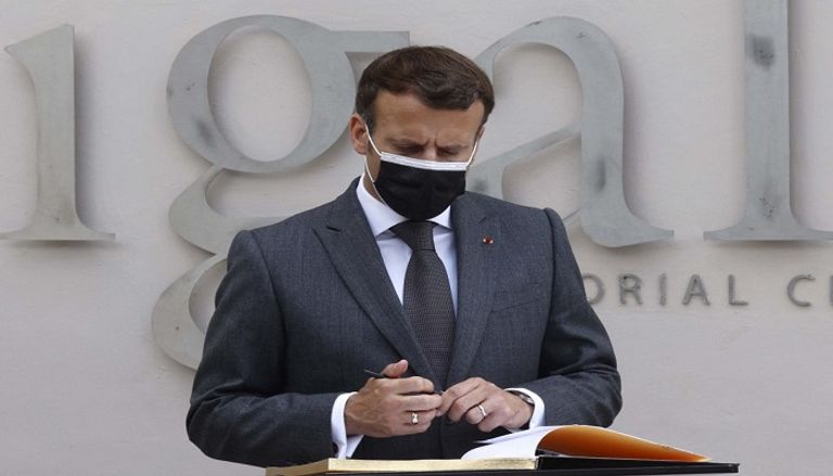 الرئيس الفرنسي إيمانويل ماكرون خلال زيارته لرواندا- أ.ف.ب