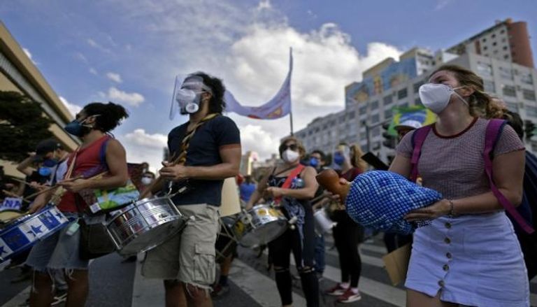 جانب من المظاهرات التي شهدتها مدن برازيلية ضد الرئيس- أ.ف.ب