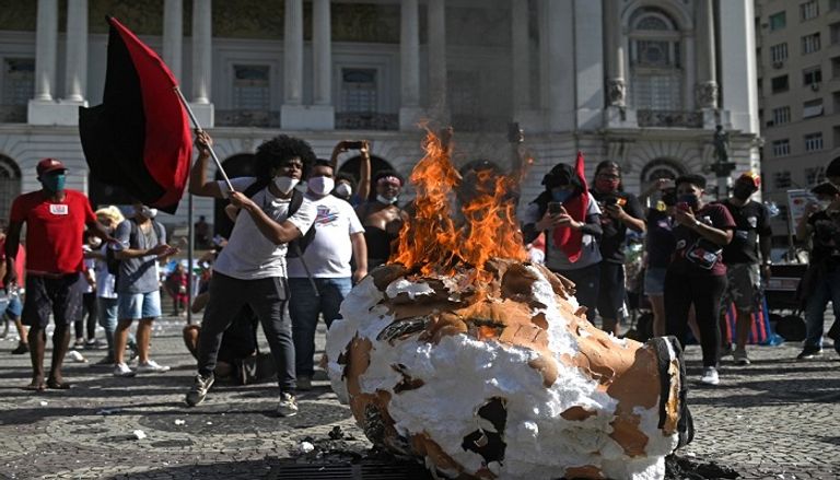 جانب من المظاهرات التي شهدتها مدن برازيلية ضد الرئيس- أ.ف.ب