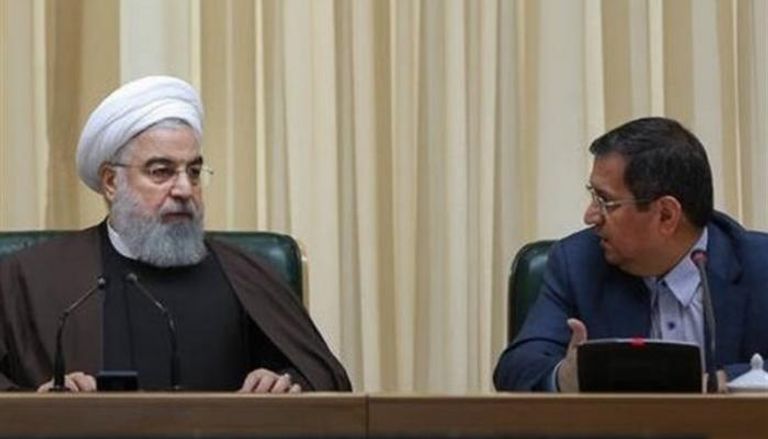 روحاني ومحافظ البنك المركزي الإيراني - أرشيفية