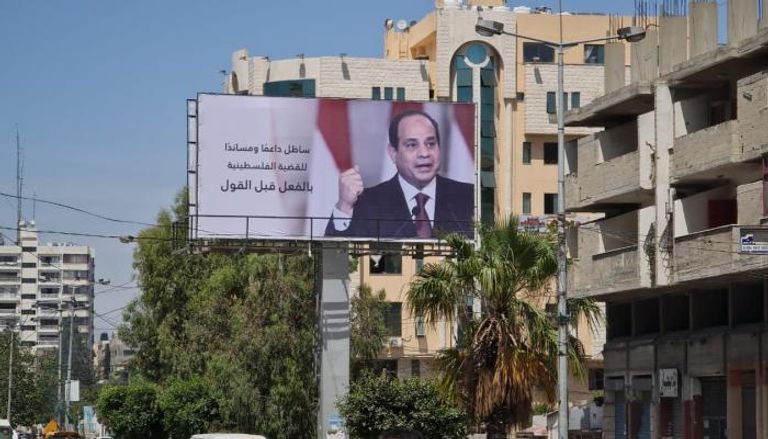 صور الرئيس المصري في شوارع غزة