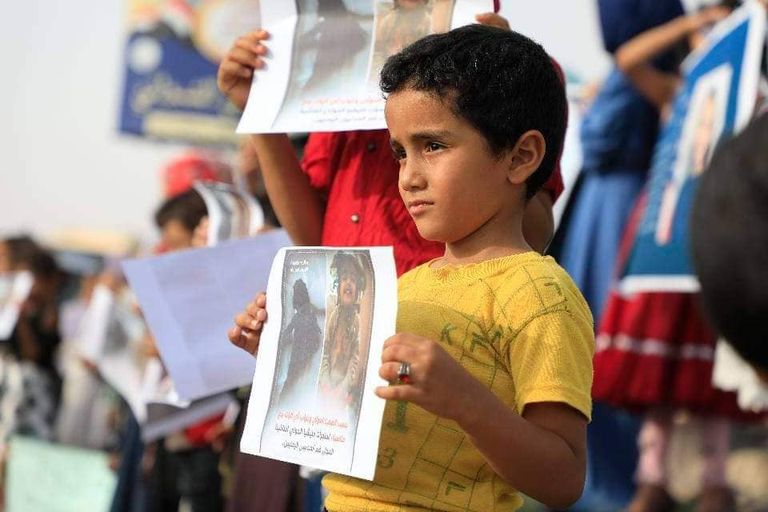 جانب من وقفة احتجاجية صامتة لأطفال مأرب