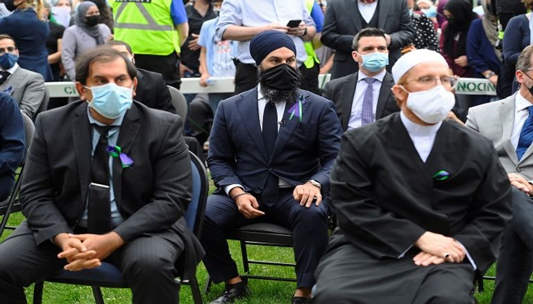 رئيس وزراء كندا خلال مشاركته في الوقفة الاحتجاجية- رويترز