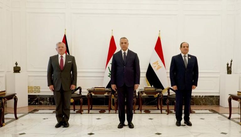 الرئيس المصري والعاهل الأردني ورئيس الوزراء العراقي