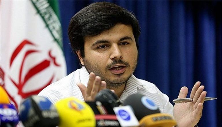 النائب الإيراني المتشدد محسن دهنوي الرئيس الإيراني حسن روحاني ونائبه الأول إسحاق جهانغيري