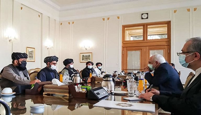 وفد من طالبان خلال لقاء سابق مع مسؤولين إيرانيين