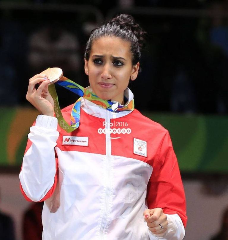 إيناس بوبكري تحمل علم تونس في أولمبياد طوكيو 2020 أنس جابر كتبت التاريخ مؤخرا في ويمبلدون