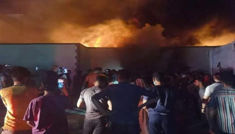 جانب من حريق مركز الشفاء بمستشفى الحسين التعليمي‎ 