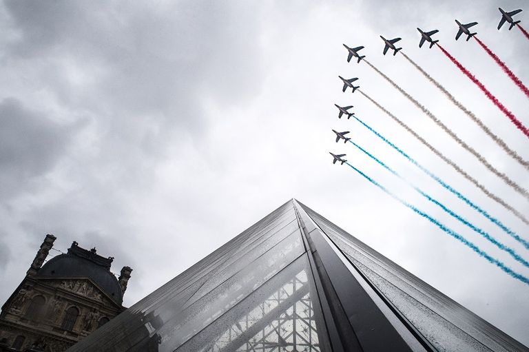 جانب من حضور ماكرون العرض العسكري- الفرنسية