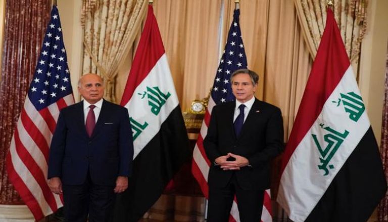 وزير الخارجية العراقي ونظيره الأمريكي - أ.ف.ب