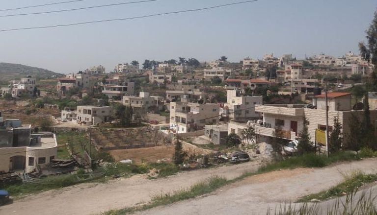 بلدية بيت أمر الفلسطينية التي وقع فيها إطلاق النار -أرشيفية
