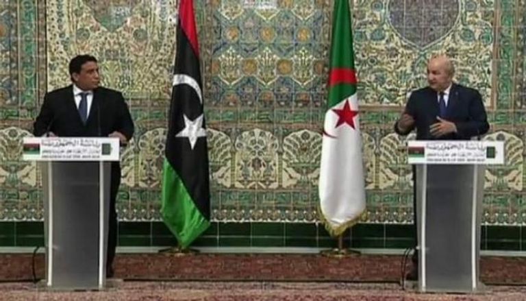جانب من المؤتمر الصحفي للرئيس الجزائري ورئيس المجلس الرئاسي الليبي