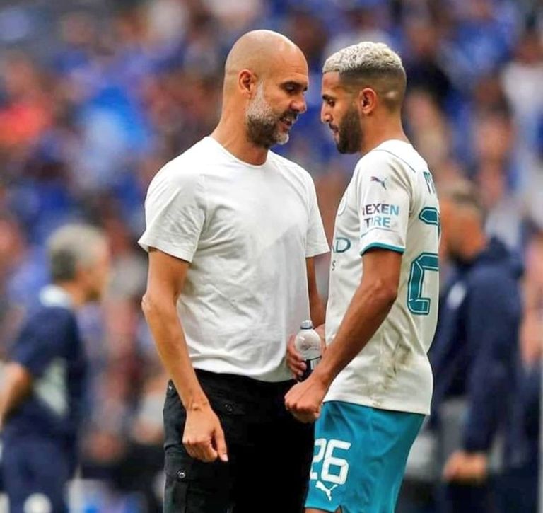 بيب جوارديولا مع جاك جريليش