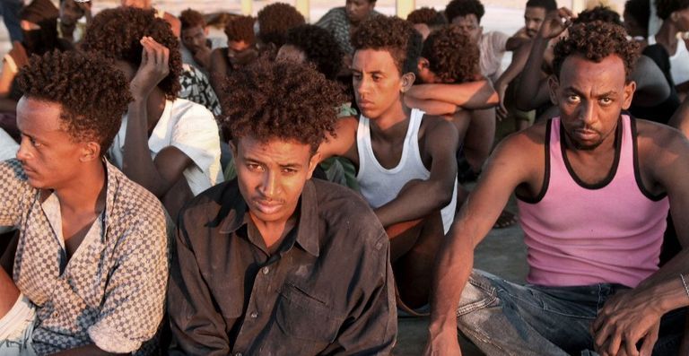 مهاجرون في أحد مراكز الاحتجاز بليبيا