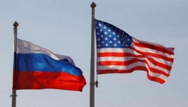 العلمان الأمريكي والروسي