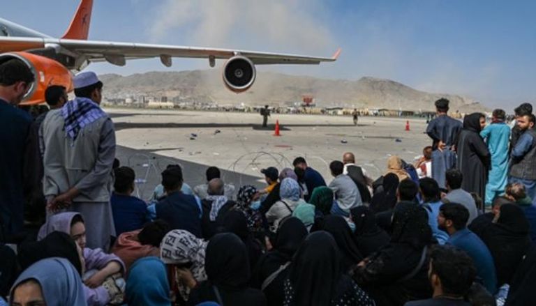 جانب من الفوضى بمطار كابول - أ.ف.ب