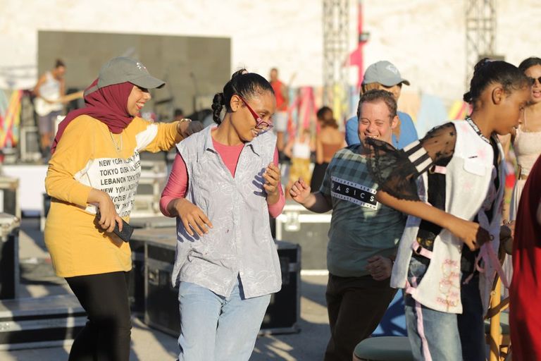 مجموعة من ذوي الهمم الموهوبين خلال مشاركتهم في السمبوزيوم