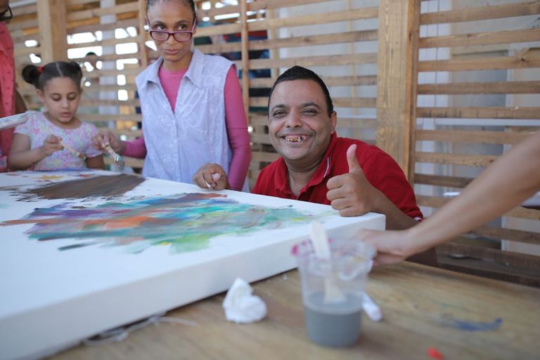 مجموعة من ذوي الهمم الموهوبين خلال مشاركتهم في السمبوزيوم