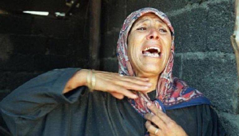 جزائرية تبكي ذبح الإرهابيين عائلتها سنوات التسعينيات - أرشيفية