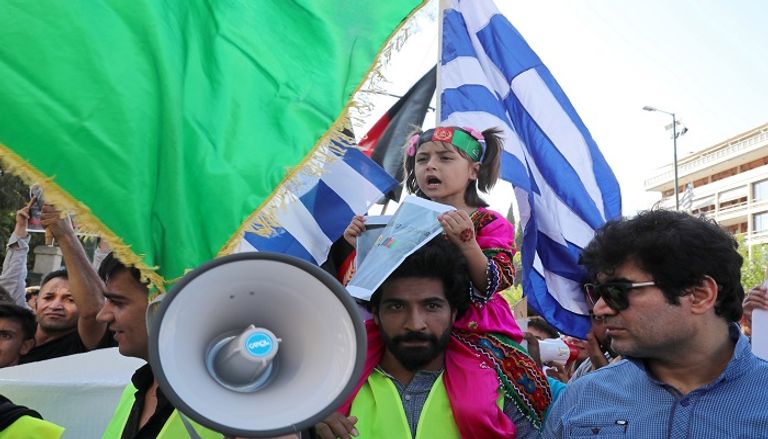 جانب من مظاهرات الأفغان في اليونان- رويترز