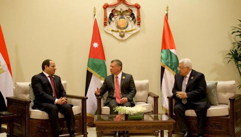 العاهل الأردني والرئيسان المصري والفلسطيني