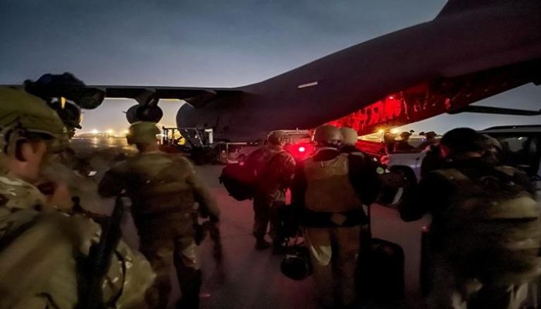 القوات الأمريكية خلال مغادرتها أفغانستان- رويترز