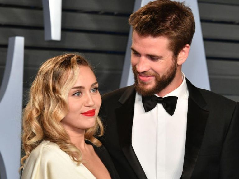 المغنية مايلي سايرس وزوجها السابق ليام هيمسوورث