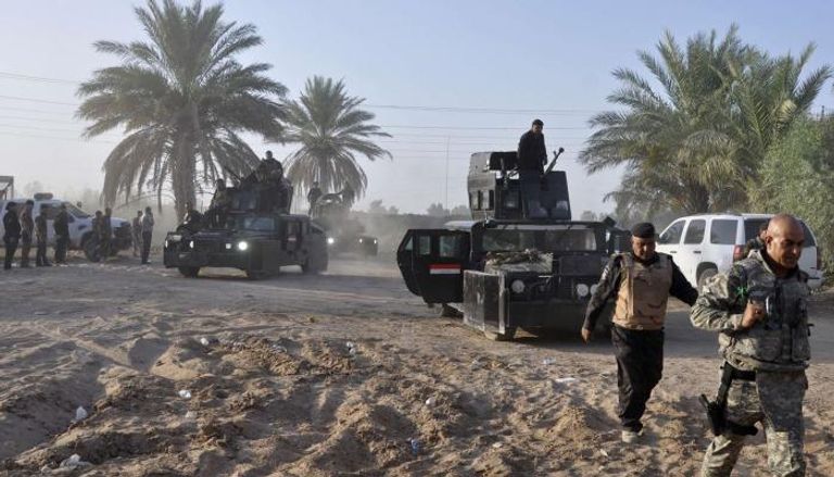 قوة أمنية خلال عملية لملاحقة عناصر داعش في العراق