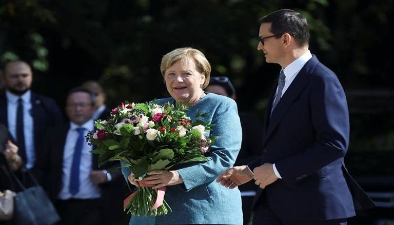المستشارة الألمانية مع رئيس الوزراء البولندي