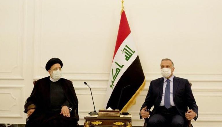 الرئيس الإيراني والكاظمي خلال الزيارة الأخيرة لطهران