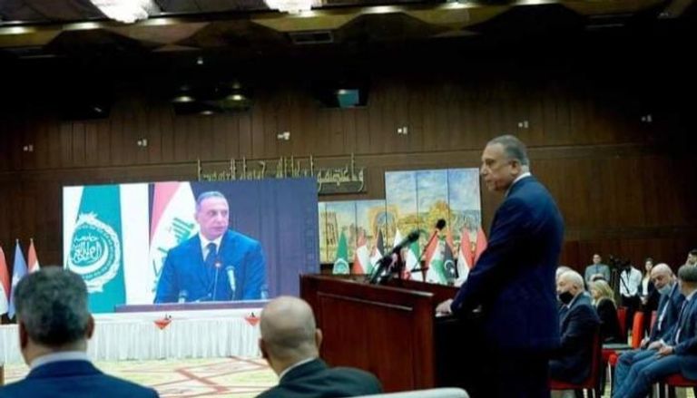رئيس وزراء العراق خلال مؤتمر بغداد لاسترداد الأموال المهربة