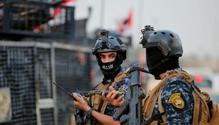 عنصران من الأمن العراقي