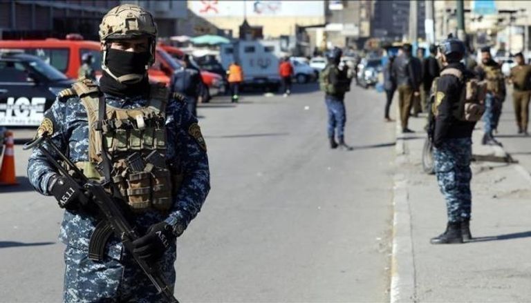 عناصر من الشرطة الاتحادية في إحدى مناطق العاصمة العراقية بغداد