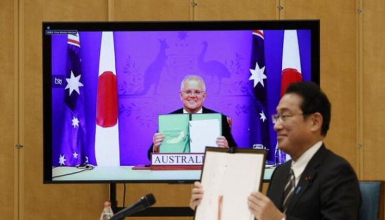 جانب من توقيع اتفاقية التعاون الأمني بين اليابان وأستراليا