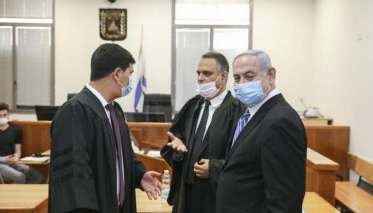 نتنياهو خلال جلسات محاكمة سابقة