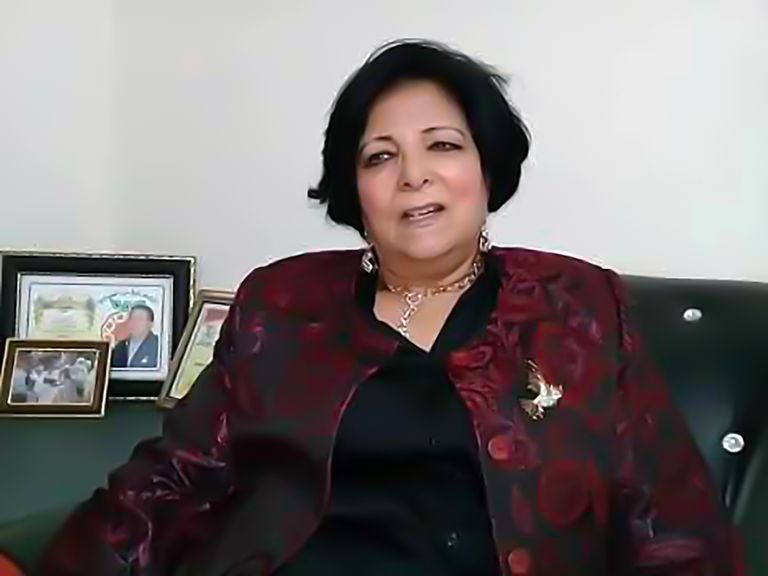 مليكة الفاسي رفقة السلطان الراحل محمد الخامس - أرشيف