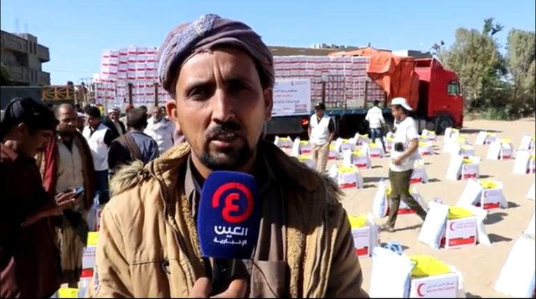 جانب من توزيع المساعدات في مديرية عسيلان