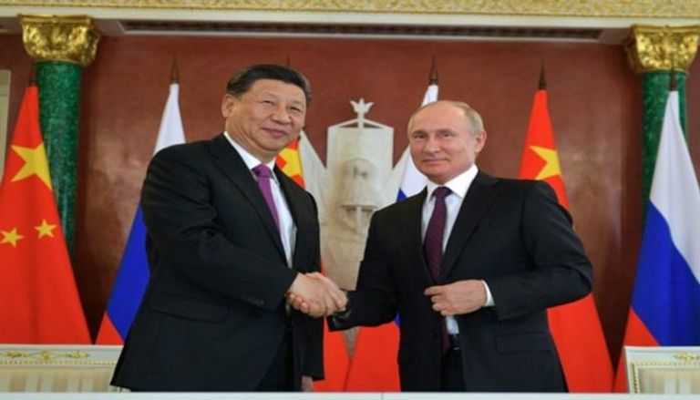 لقاء سابق بين بوتين وشي جين بينغ